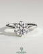 Kynora CJ 2ct round claw solitaire engagement ring with petal gallery and tapered band, showcasing elegant jewelry craftsmanship.