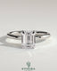 Kynora CJ 2ct emerald claw solitaire engagement ring with a wrap-around hidden halo setting, featuring a sparkling emerald center stone.