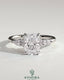 Kynora CJ 2ct elongated cushion claw solitaire engagement ring with pear accents and round shoulder stones, three-stone design.