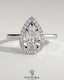 Kynora CJ 2ct pear-shaped diamond solitaire halo engagement ring with cathedral high setting, elegant and sparkling jewelry piece.