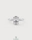Oval cut moissanite solitaire engagement ring in 925 sterling silver with a sleek band and sparkling center stone.