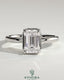 Bezel engagement ring with 2ct emerald claw solitaire diamond set in a sleek bezel frame by Kynora CJ.