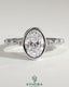 Kynora CJ 2ct oval bezel solitaire engagement ring with marquise and round accent stones, elegant gold band.