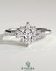 Bezel engagement ring by Kynora CJ featuring a 2ct princess claw solitaire with angled setting and clustered round shoulder stones.