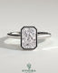 Kynora CJ 2ct radiant bezel solitaire engagement ring with hidden halo and cathedral high setting, showcasing intricate design details.