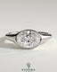 Kynora CJ 2ct oval east-west bezel solitaire engagement ring with signet band, featuring a central diamond and sleek gold design.