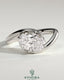Kynora CJ 2ct oval East-West claw solitaire engagement ring with bypass band, showcasing a sparkling oval diamond and elegant design.
