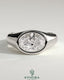 Kynora CJ statement 2ct oval east-west bezel solitaire engagement ring with signet band, featuring a prominent oval diamond.