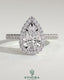 Kynora CJ 2ct pear-shaped diamond solitaire engagement ring with halo, pave band, and cathedral high setting.