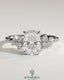 Kynora CJ 2ct elongated cushion claw solitaire engagement ring with clustered round shoulder stones, elegant and sparkling.