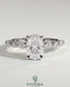 Kynora CJ 2ct elongated cushion solitaire engagement ring with marquise, round accent stones, and hidden halo design.