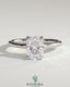 Kynora CJ 2ct elongated cushion claw solitaire engagement ring with petal gallery, leaf accents, and cathedral setting.