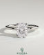 Kynora CJ 2ct elongated cushion claw solitaire engagement ring with petal gallery and accented tiara detail, featuring a sparkling diamond.