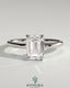 Kynora CJ 2ct emerald claw solitaire engagement ring with hidden halo and floating cathedral low setting, showcasing intricate design.