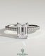Kynora CJ 2ct emerald claw solitaire engagement ring with hidden halo, pave band, and cathedral high setting.