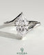 Kynora CJ 2ct marquise claw solitaire engagement ring with bypass band, showcasing a sparkling marquise-cut diamond and sleek band design.