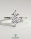 Kynora CJ 2ct marquise claw solitaire engagement ring with a wrap-around hidden halo, showcasing elegant diamond craftsmanship.
