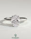 Kynora CJ 2ct oval claw solitaire engagement ring with hidden halo and cathedral high setting, showcasing elegant diamond design.