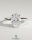 Kynora CJ 2ct oval claw solitaire engagement ring with hidden halo, tapered band, and cathedral high setting.