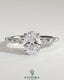 Kynora CJ 2ct oval claw solitaire engagement ring with marquise-round accents and a hidden halo, showcasing elegant jewelry design.