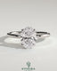 Kynora CJ 2ct oval claw solitaire engagement ring with petal gallery and leaf accents, showcasing intricate metalwork and a sparkling center stone.