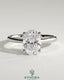 Kynora CJ 2ct oval claw solitaire engagement ring with pinched tapered band and cathedral low setting, showcasing elegant jewelry design.