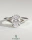 Kynora CJ 2ct oval claw solitaire engagement ring with split shank and cathedral high setting, showcasing elegant diamond design.