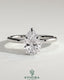 2-carat pear-shaped diamond solitaire engagement ring with wrap-around hidden halo by Kynora CJ, showcasing elegant jewelry design.