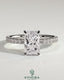Kynora CJ 2ct radiant diamond claw solitaire engagement ring with wrap-around hidden halo and pave band details.