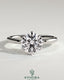 Kynora CJ 2ct round claw solitaire engagement ring with crown gallery setting showcasing a sparkling diamond on a sleek band.