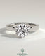 Kynora CJ 2ct round diamond claw solitaire engagement ring with flat cigar band and hidden halo design.