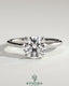 Kynora CJ 2ct round diamond solitaire engagement ring with hidden halo and floating cathedral low setting, elegant jewelry.