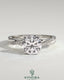 Kynora CJ 2ct round diamond solitaire engagement ring with hidden halo and twisted pave band, showcasing elegant craftsmanship.