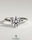 Kynora CJ 2-carat round claw solitaire engagement ring with hidden halo, showcasing sparkling diamond and elegant design.