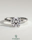 Kynora CJ 2ct round claw solitaire engagement ring with inset round accent stones, elegant and sparkling jewelry piece