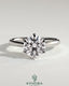 Kynora CJ 2ct round diamond claw solitaire engagement ring with a solid cathedral high setting, showcasing elegant jewelry craftsmanship.