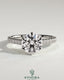Kynora CJ 2ct round diamond claw solitaire engagement ring with trellis gallery, pave band, and cathedral low setting.