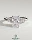 Kynora CJ 2ct radiant claw solitaire engagement ring with pear-shaped accents and round shoulder stones, elegant three stone design