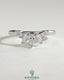 Kynora CJ accent stone wedding band with curved design, showcasing smooth metal band and sparkling stone accents on a white background.