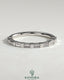 Kynora CJ wedding band featuring baguette spaced accent stones in a sleek, elegant design for special occasions.