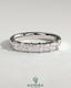 Kynora CJ Radiant East West Accent Stone wedding band with closed basket setting, showcasing sparkling gemstones and sleek gold design.