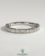 Kynora CJ round wedding band with baguette accent stones and milgrain detailing, showcasing elegant, handcrafted jewelry design.