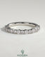 Kynora CJ round mixed size accent stone wedding band featuring multiple small stones, elegant and sparkling for special occasions.