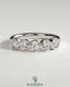 Kynora CJ round bezel set wedding band with a sleek, polished design, showcasing a smooth, circular bezel setting on the gold ring.