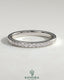 Kynora CJ round channel set wedding band with a sleek, polished design featuring embedded gemstones on a silver band.