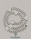 Sterling silver 14mm heart shape and 10mm Miami Cuban chain hip hop jewelry by Kynora Jewels, featuring diamond accents.