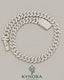16 mm VVS 925 silver moissanite Cuban link chain hip hop jewelry by Kynora Jewels, showcasing the shiny, detailed chain design.