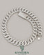 22mm VVS1 Moissanite sterling silver Cuban link chain, hip-hop style jewelry by Kynora Jewels with sparkling diamond-like stones.