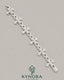 Fully iced-out cross moissanite hip hop diamond bracelet by Kynora Jewels with sparkling stones and bold design.