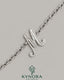 VVS Moissanite diamond "M" sterling silver anklet by Kynora Jewels, featuring hip-hop style design and intricate craftsmanship.